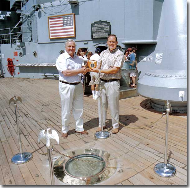 This official photo of handing over the NHSA plaque. It shows the brass plate commemorating the actual place where the Instrument of Surrender Documents were signed on the 2nd. of September 1945.