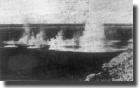 Shipping in Port Moresby being attacked by Japanese bombers 1942