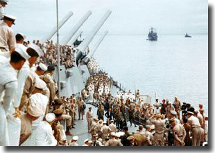 US sailors on board USS Missouri, seek a vantage point, as the Japanese delegates come on board for the Surrender ceremony on the morning of Sunday the 2nd. of September 1945, in Tokyo Bay.