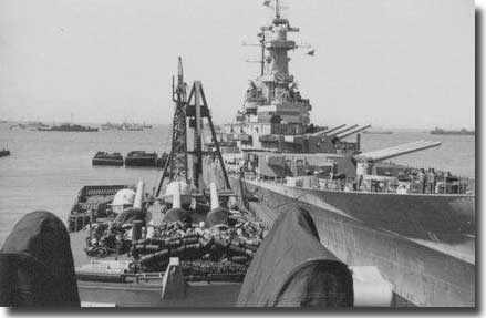 USS Missouri 
 Unloading her 16 inch ammunition, with USS Denver alongside, December, 1945