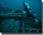 Mark Ryan diving on the wreck of TSS Kawowna, by the starboard deck crane. Thanks to Gregory Hodge for permission to use this photograph.