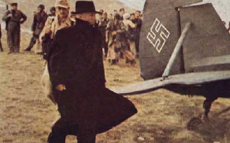 Mussolini's liberation on 12 September 1943 as he prepares to fly out in General Kurt Student's personal Feisler Storch, the German equivalent of the American Piper Cub.