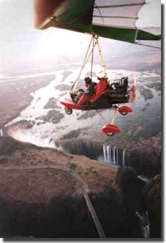 Flying low over Victoria Falls in the back seat of a Microlite aircraft