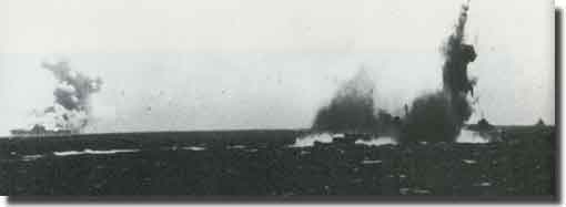 USS Wasp and destroyer USS O'Brien both caught in same photograph, both victims of Japanese Torpedoes