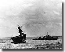 USS Yorktown being abandoned, hit by 2 aerial torpedoes, she rolled over and sank May 7, at Battle of Midway