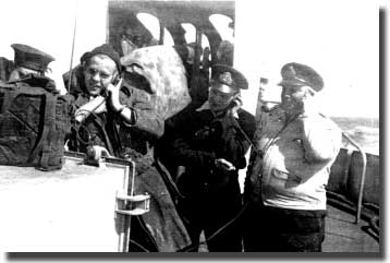 The one on the ship's bridge showing Commander George Stephen with other Officers of the Dunver