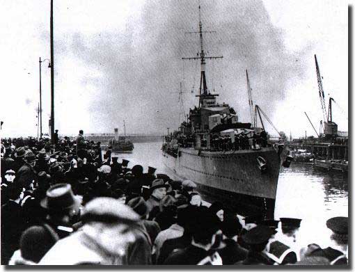 HMS Cossack arrives at Leith, Scotland with her load of British Merchant Captains,
 Officers and crews, February 17 1940, after their dramatic rescue from the German Altmark.