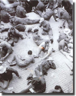 Members of First AIF, play Housie Housie on deck of HMAT Shropshire, enroute to Egypt from Australia in 1915.