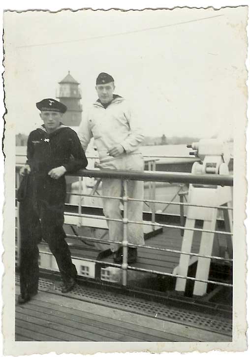 Willy's brother Georg who was lost in a U-Boat in October 1943 is in the dark uniform.  His friend in white is not named. 