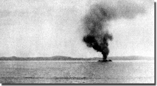 George F Elliott on fire off Guadalcanal