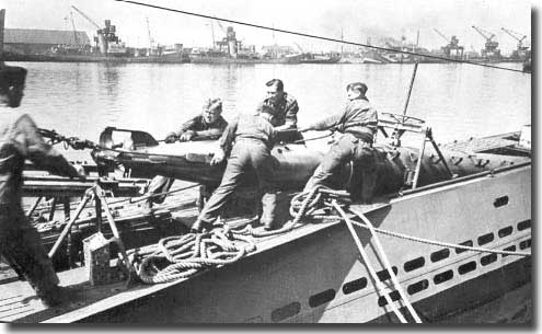 Loading a torpedo into a German U-Boat