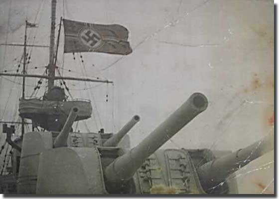 A captured German Ensign from Graf Spee flies on board Achilles.