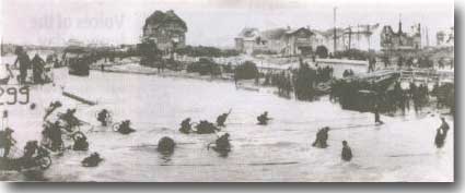 Troops wade ashore on the 6th. of June 1944. D Day