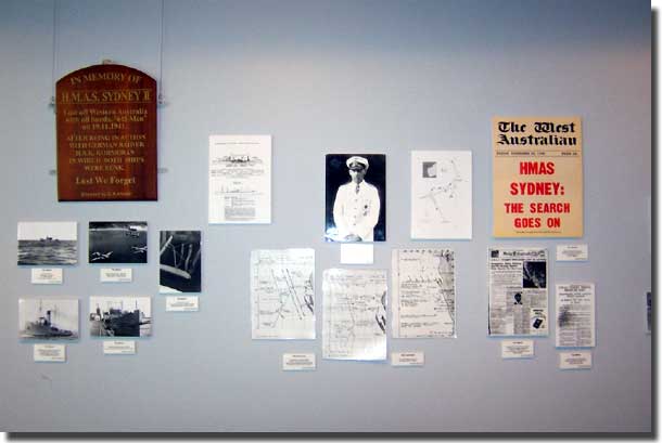 The back wall with the Kormoran pieces including a picture 
 of her Captain Detmers