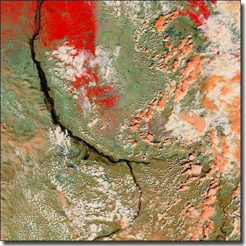 Flooding on the Lena river. The Delta covered in ice shows as red, the River would normally show as a black line, with land areas dull green or tan.